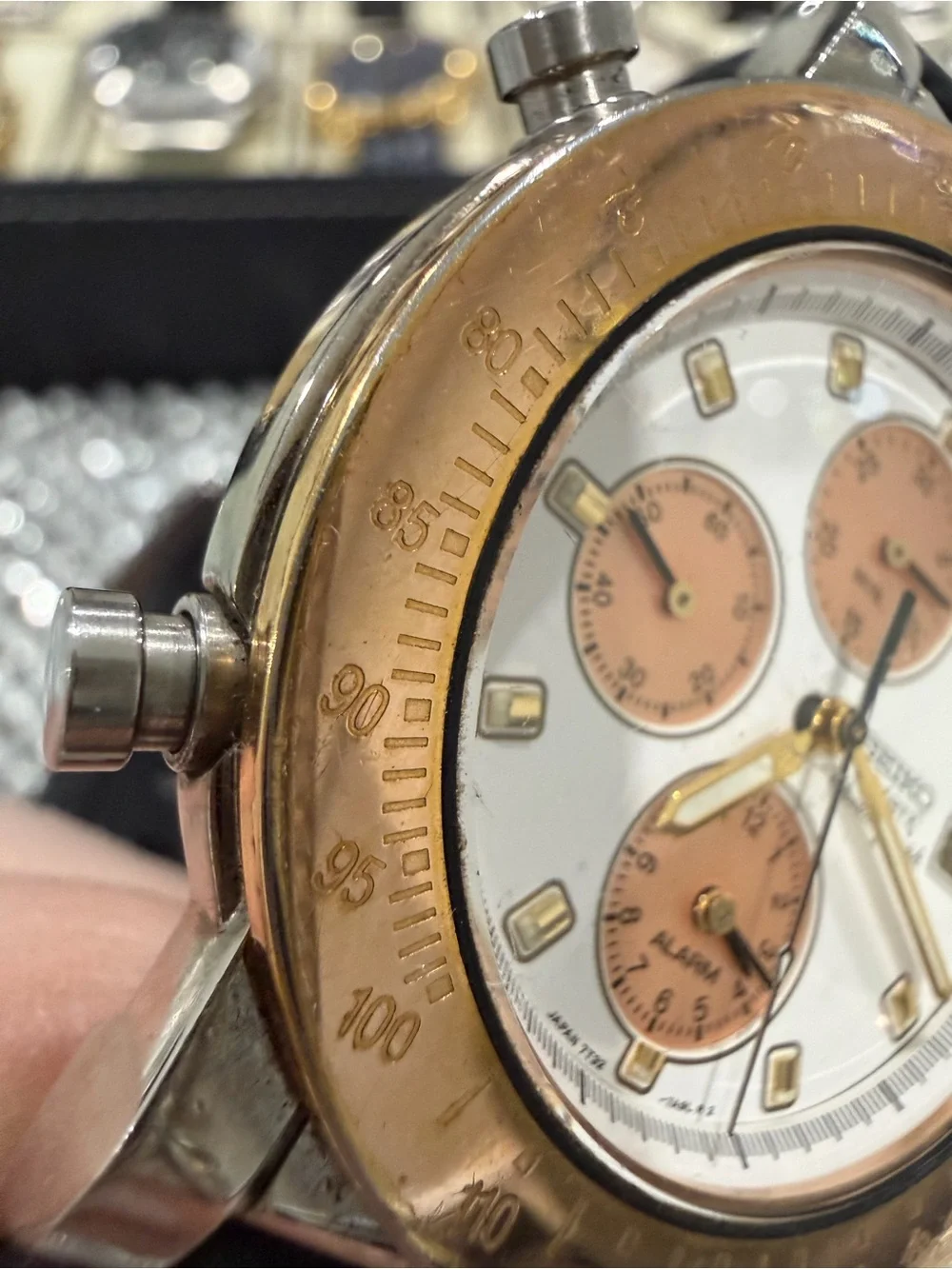 Seiko White Dial Watch with Gold-Tone Accents and Black Strap